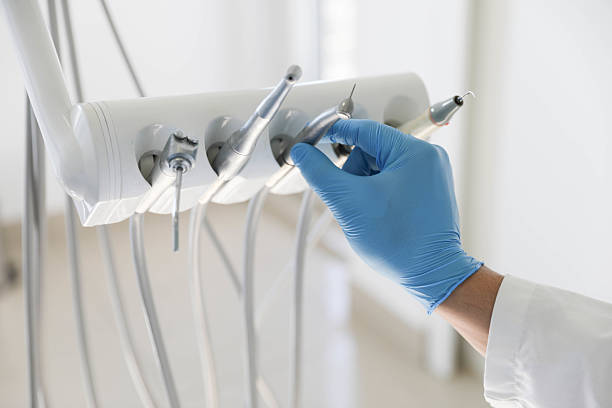 Professional Tooth Extraction technician working in Salem, IL